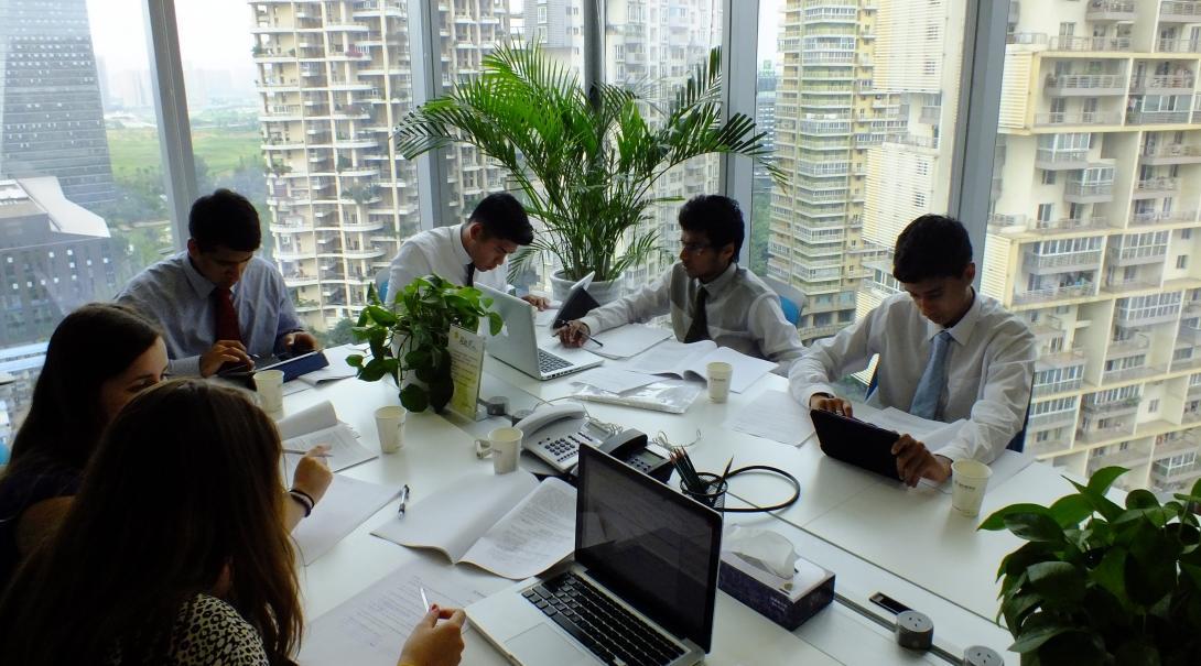 A group of legal interns attend a meeting with local lawyers at a legal firm in China. Projects Abroad Law interns attend a meeting run by experienced local lawyers at a firm as part of their Law internship in China.